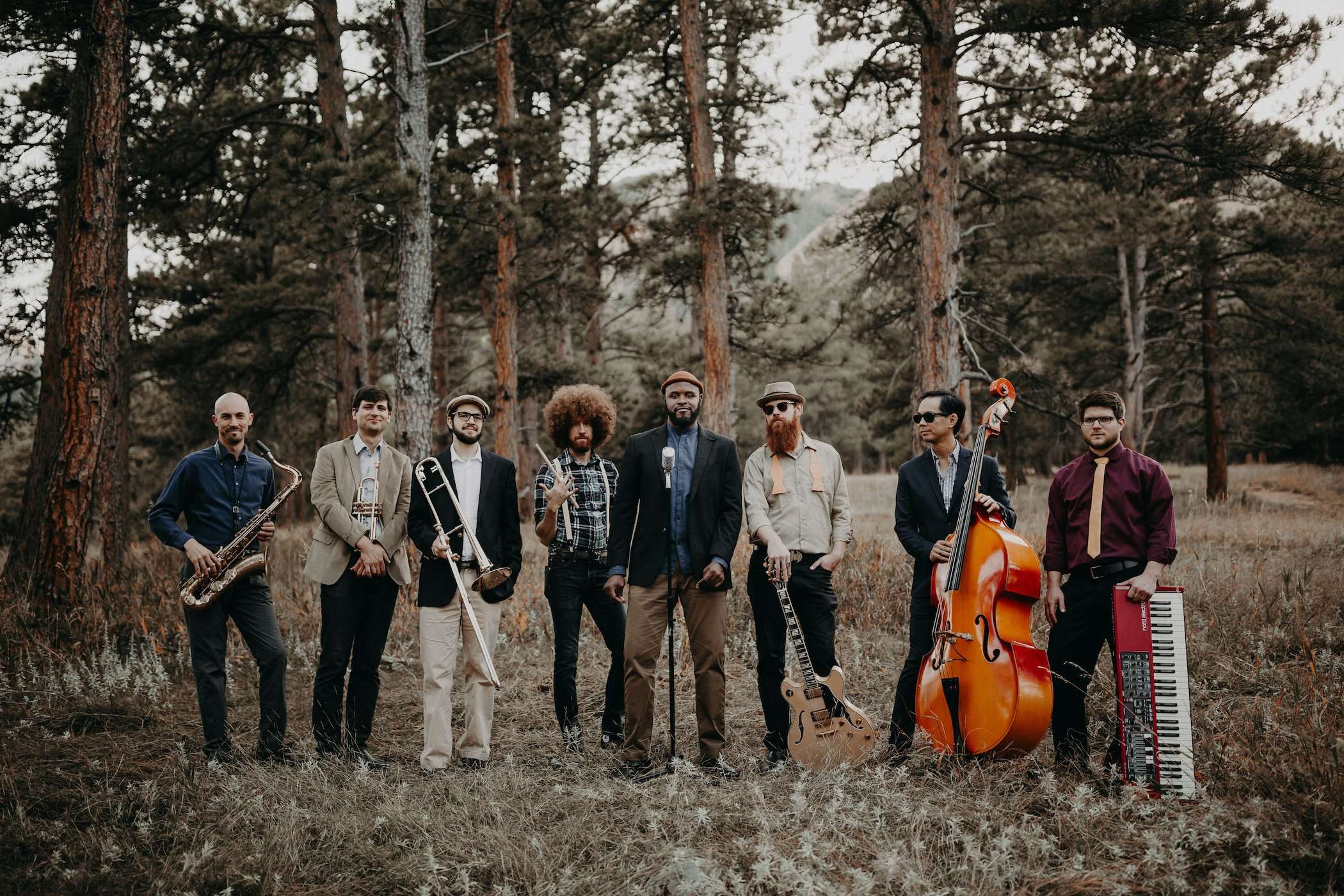Diamond Empire Band performing live at a wedding, with guests dancing and enjoying the music.