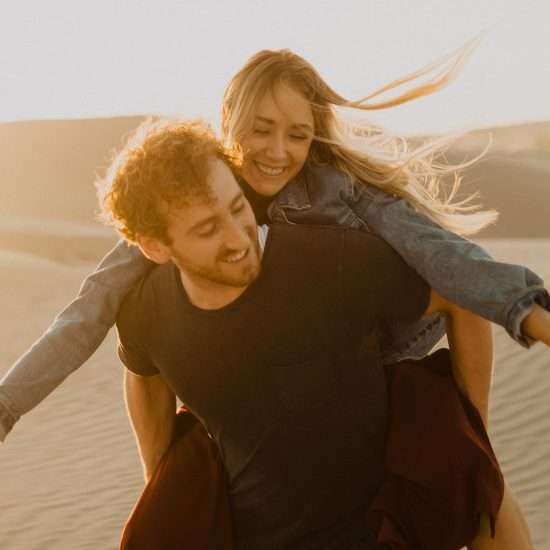 Lighthearted Sand Dunes Engagement