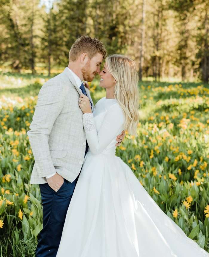 Cute and Merry Bridals in a Meadow