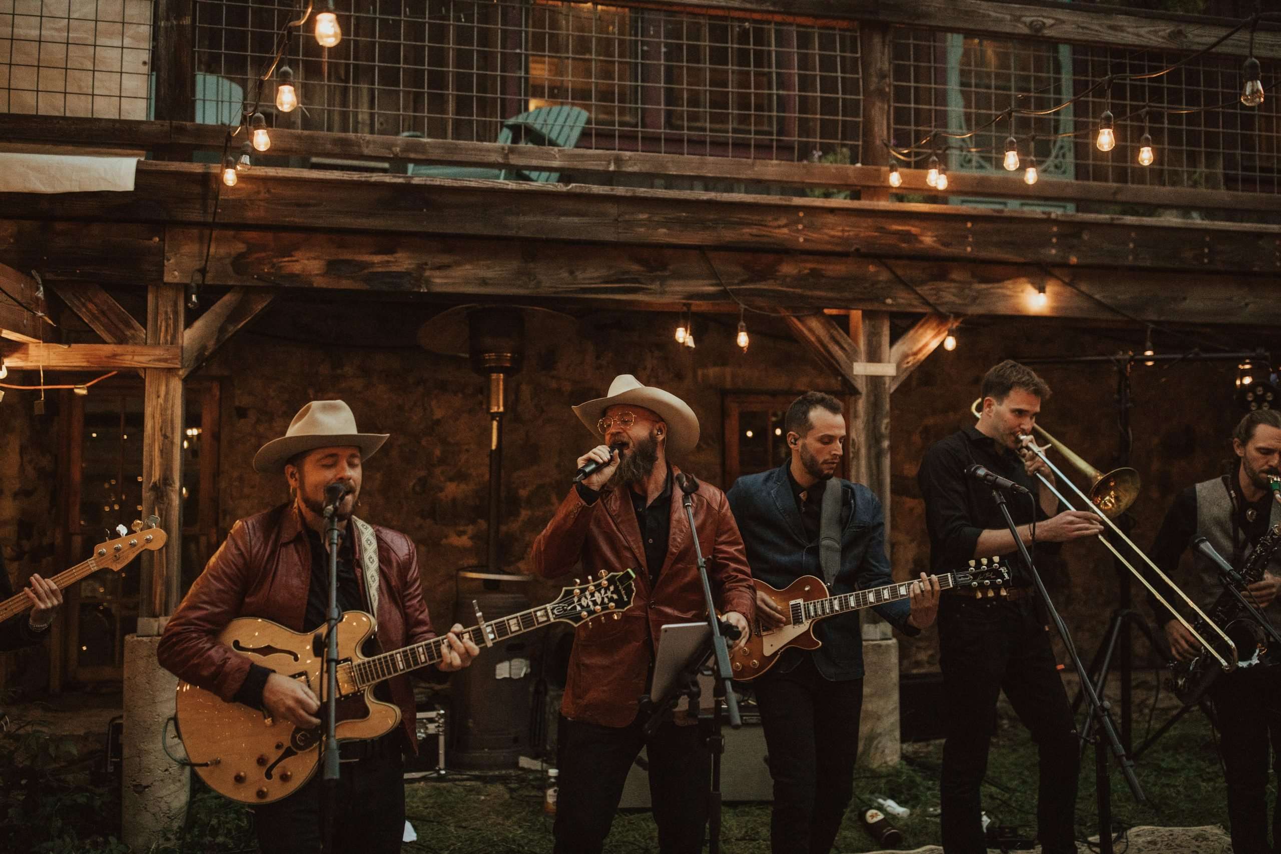 Desert Child band performing live music at a wedding, setting a soulful ambiance.