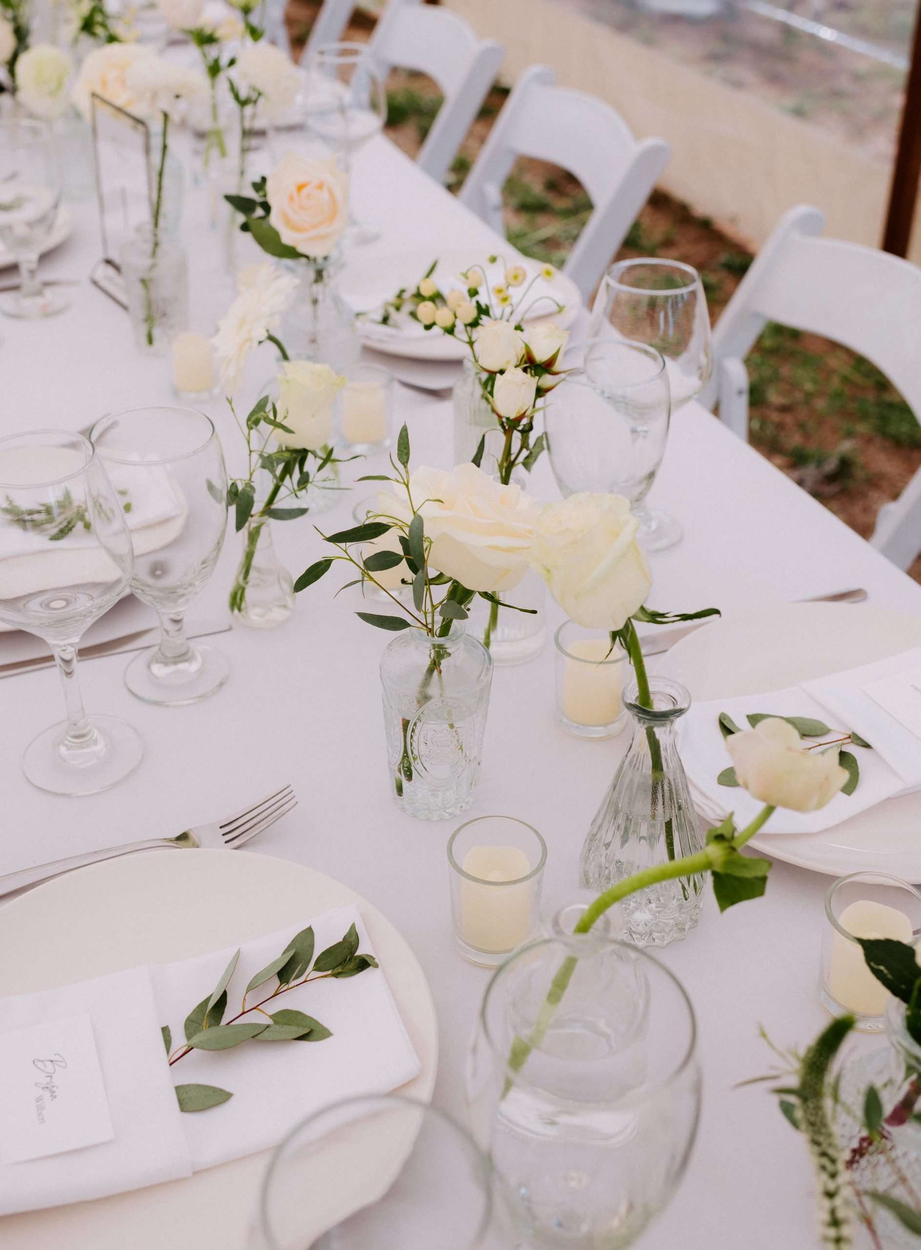 Colorado wedding reception table with bud vases and white flowers for wedding decor