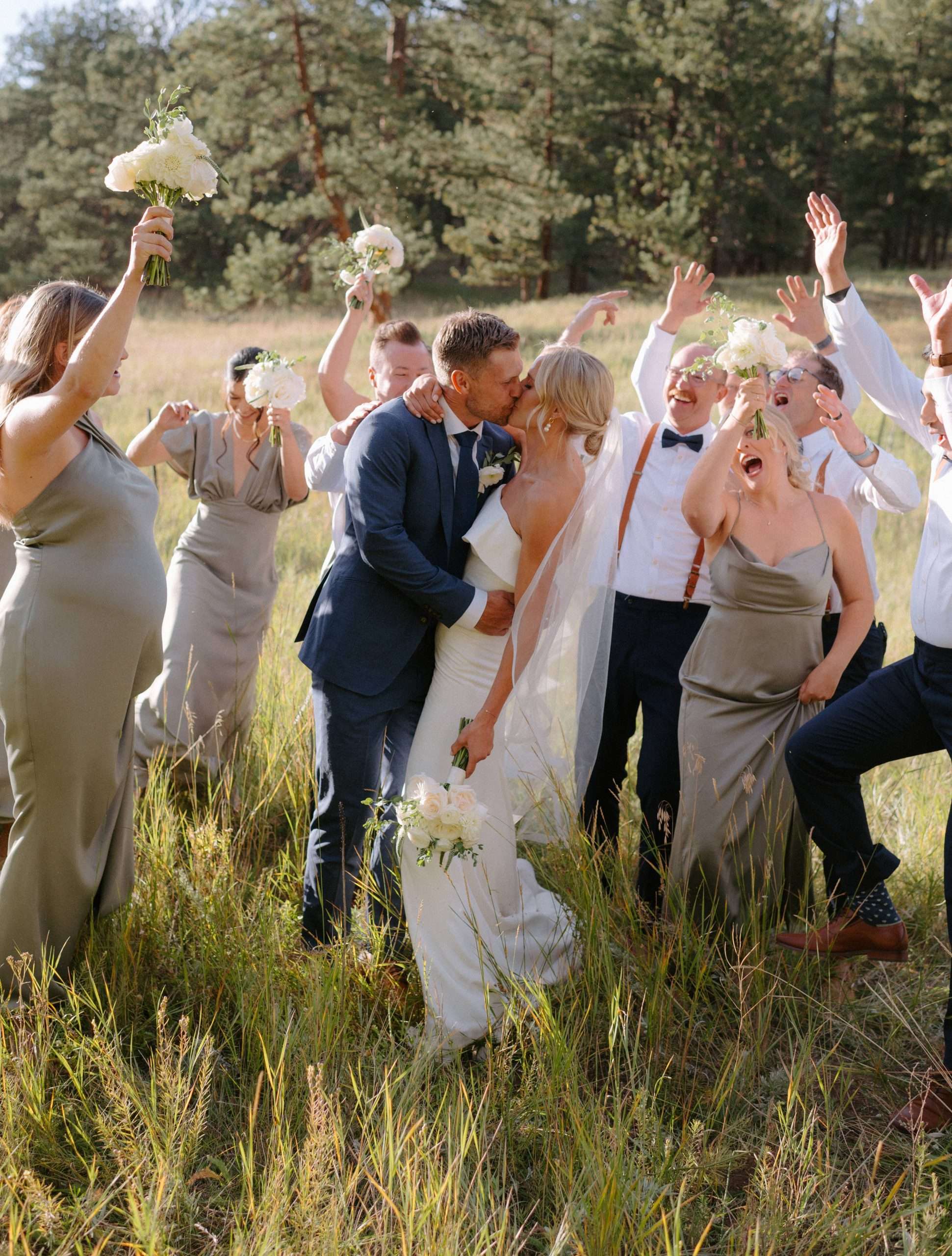 Colorado wedding bridal party celebrate the couple's marriage