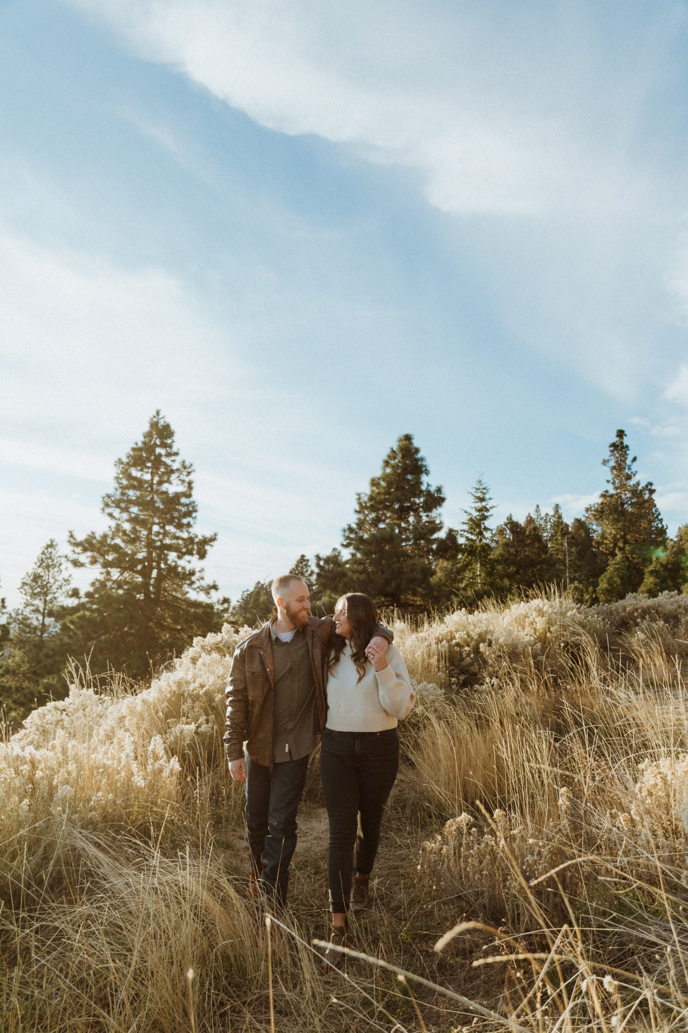 couple walking side by side for their Boise Idaho Winter Engagement Session