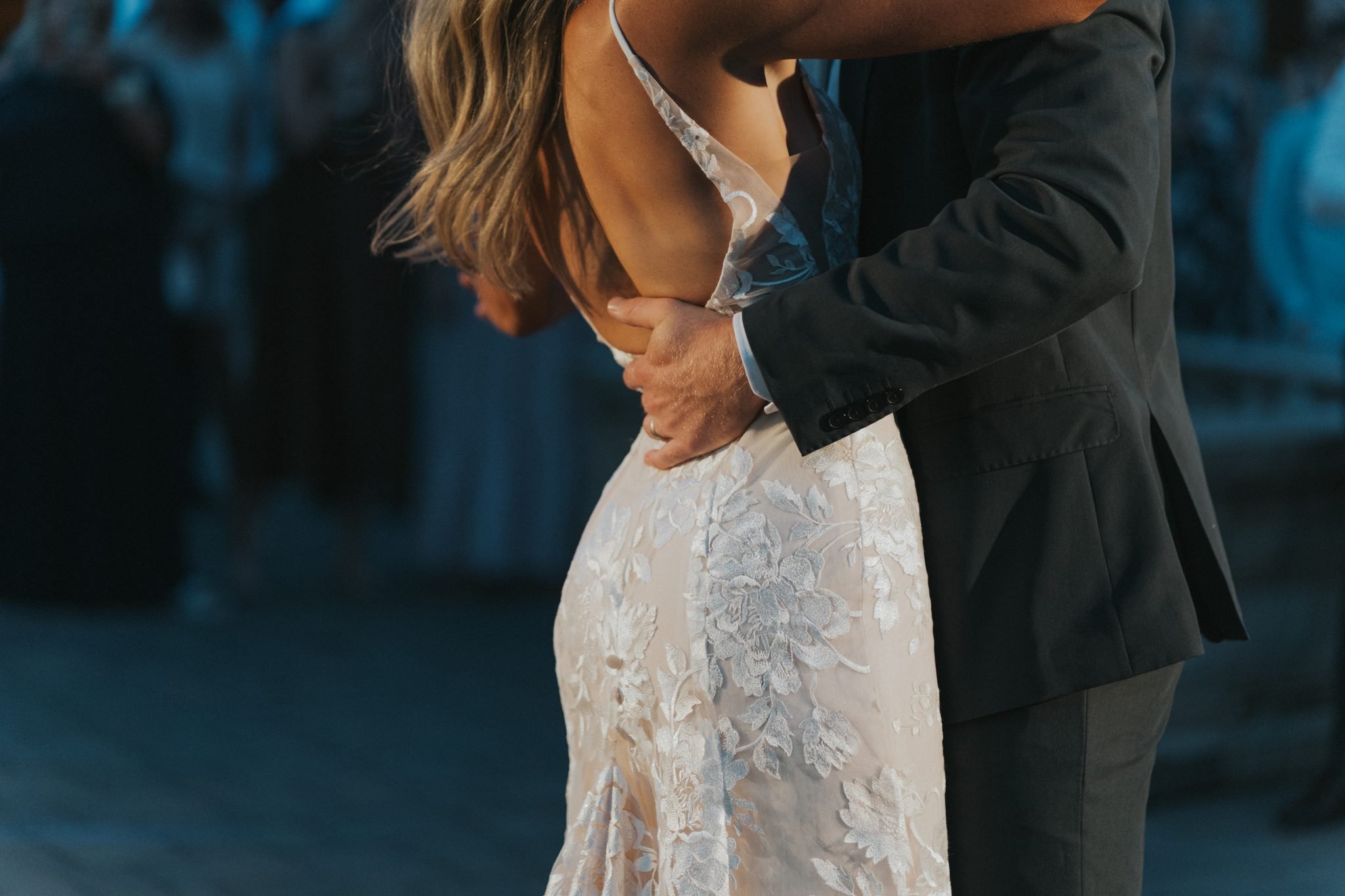 couple dancing under the market lights for a spruce mountain ranch summer wedding