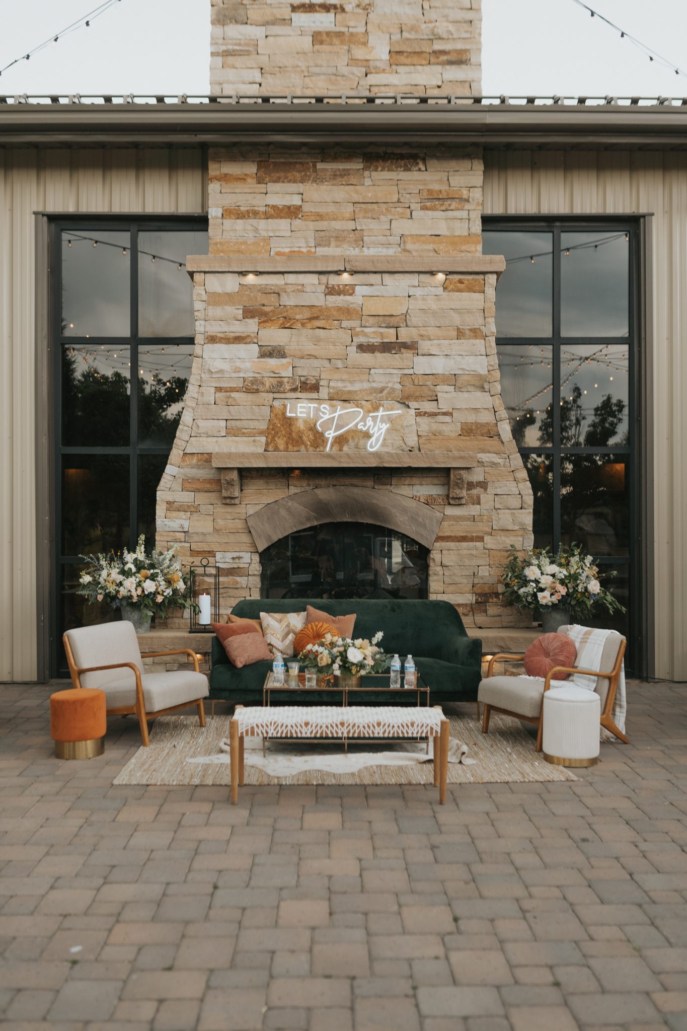 cute furniture set up in the courtyard of spruce mountain ranch summer wedding