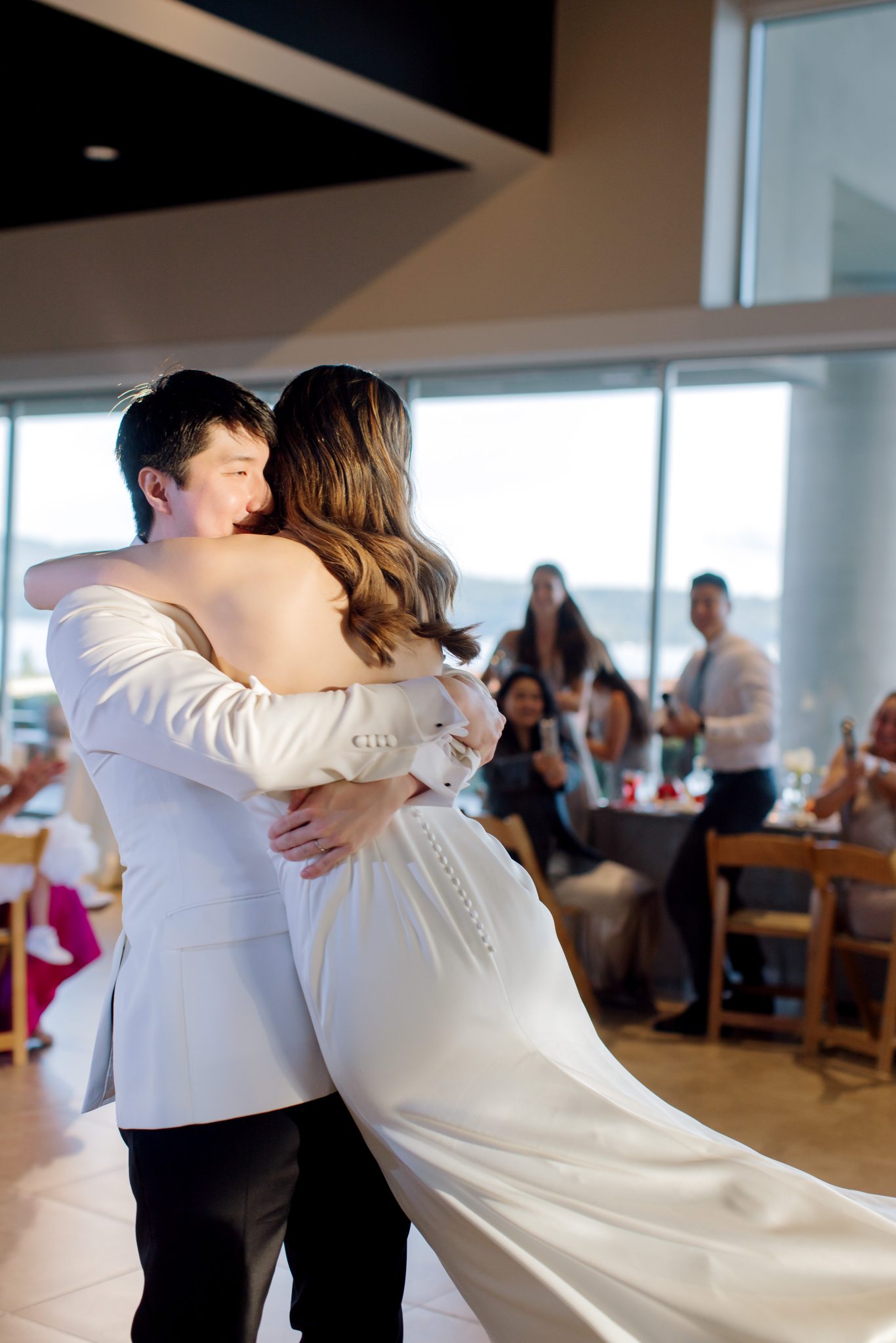 idaho summer wedding couple's first dancing spinning on the dance floor