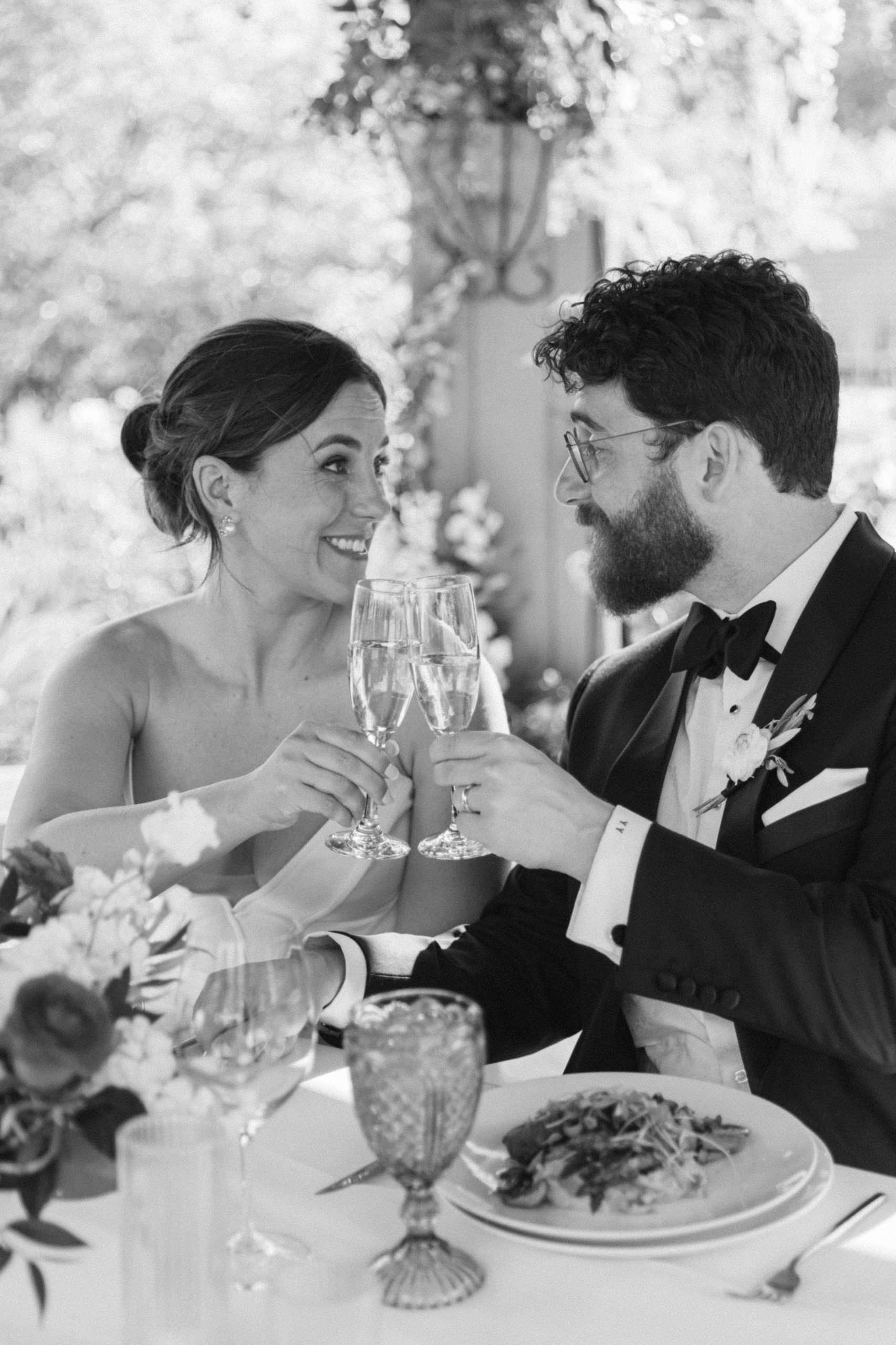 denver garden wedding couple cheersing