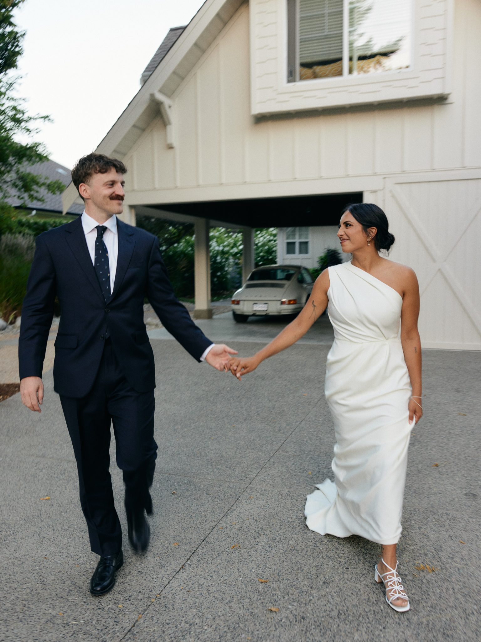 bride and groom holding hands for their British Columbia Summer Wedding