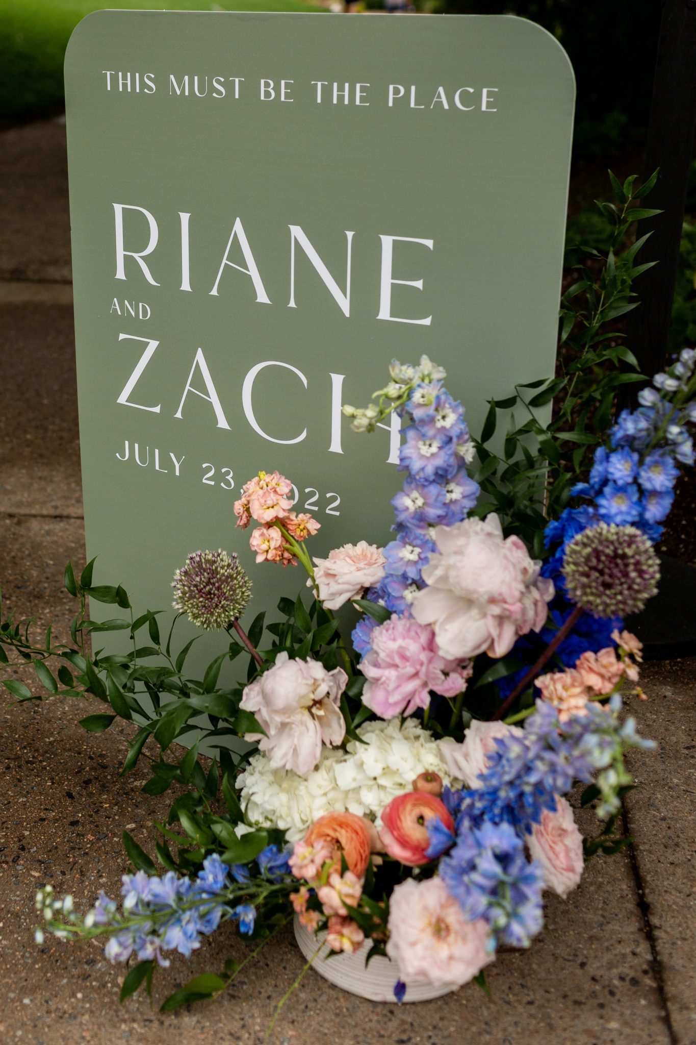 Denver Botanic Gardens Colorado Wedding welcome sign with colorful florals as an accent piece