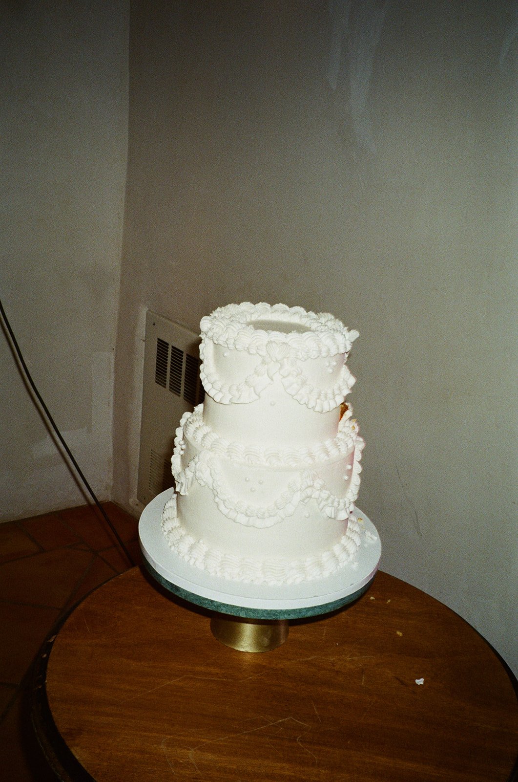The Stakeout Taos Wedding's two-tiered decorated wedding cake