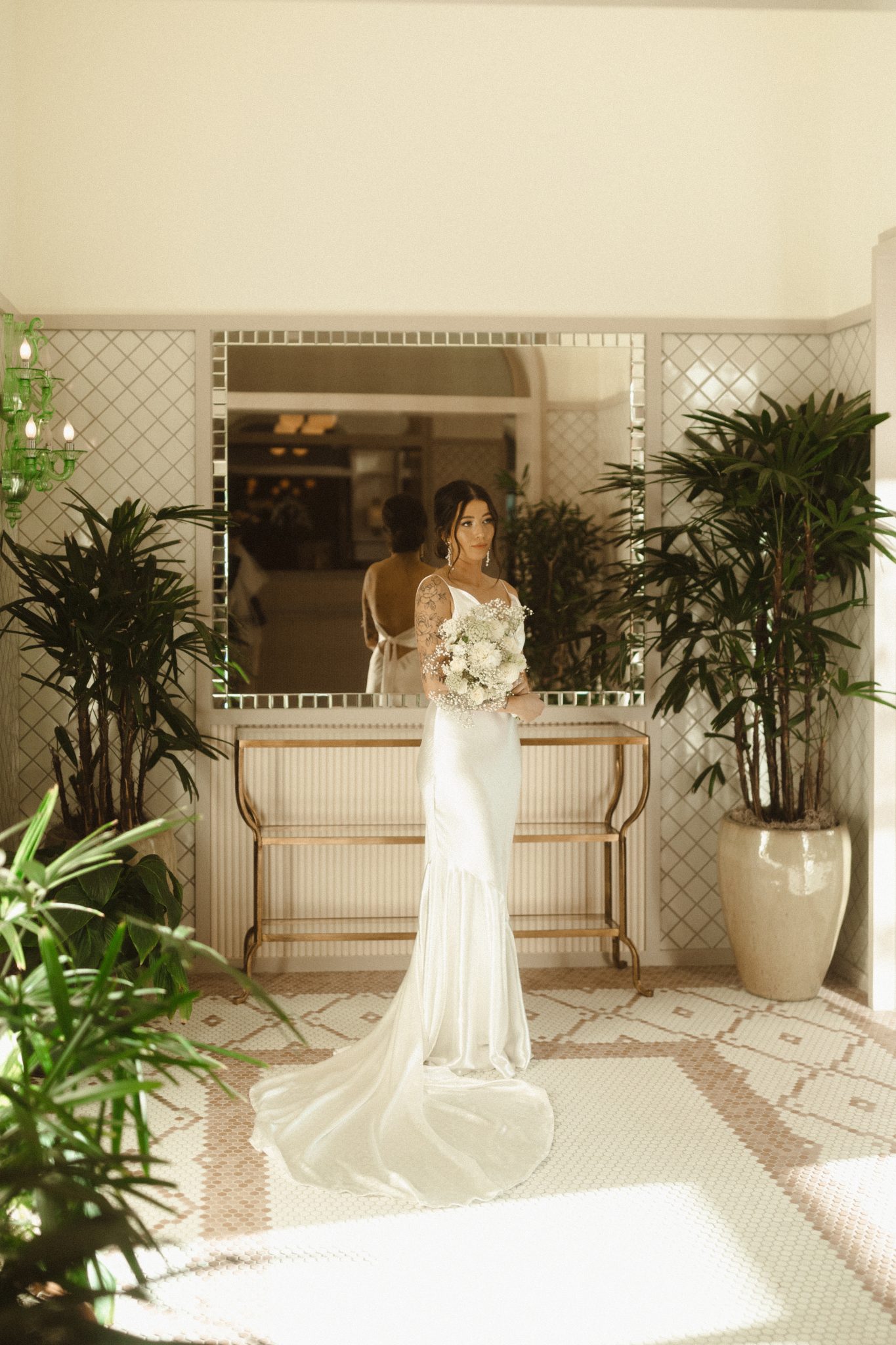 Salt Lake City Utah Wedding bride wearing a sleek wedding dress while holding her wedding bouquet