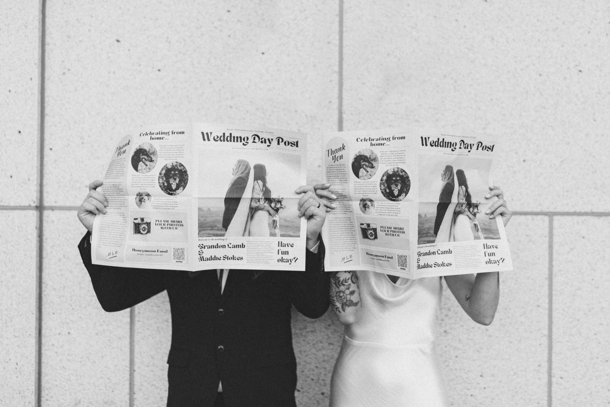 Salt Lake City Utah Wedding bride and groom holding up their wedding newspaper