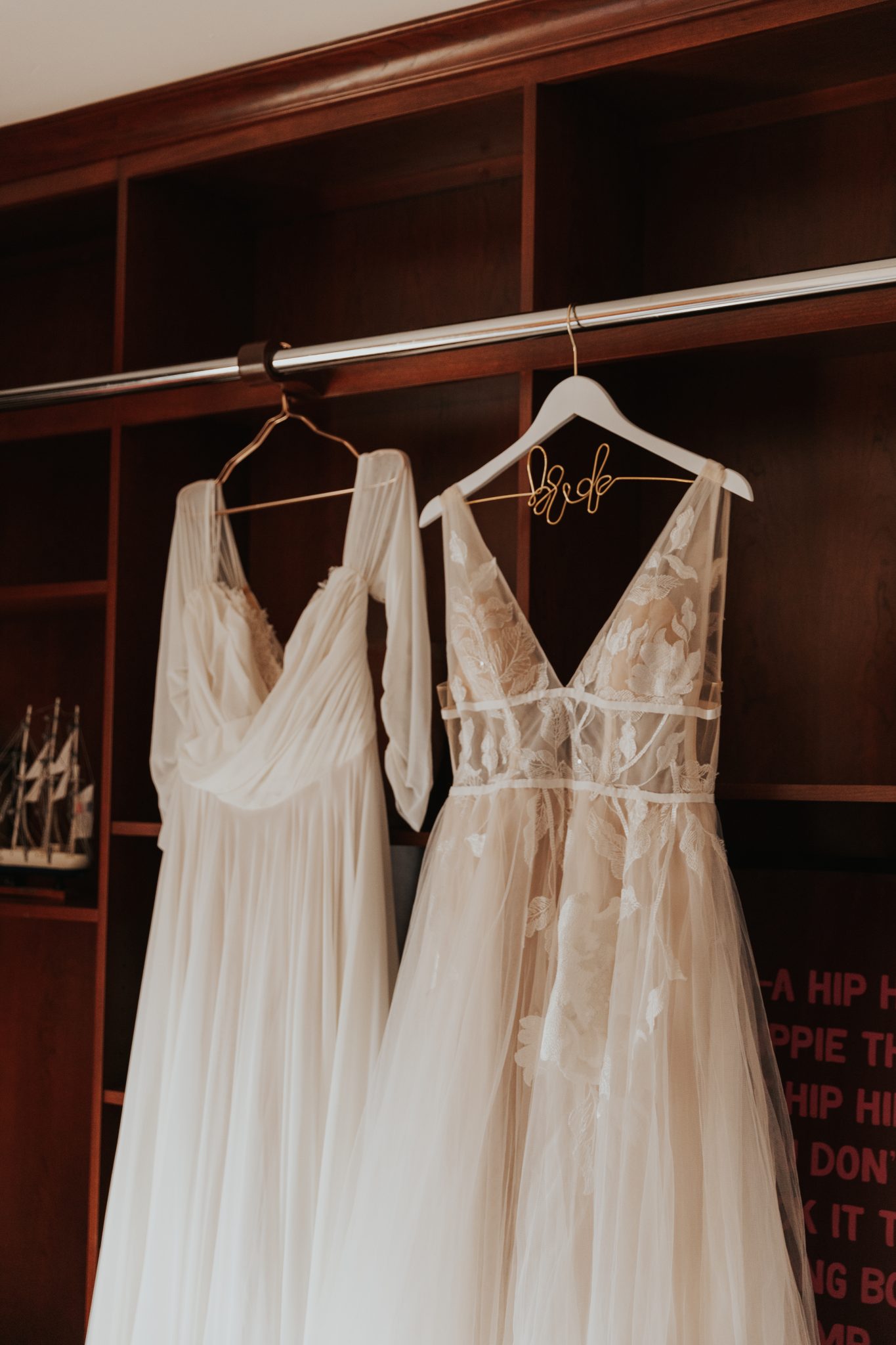 Denver Botanic Gardens Wedding LGBTQIA+ wedding dresses hanging