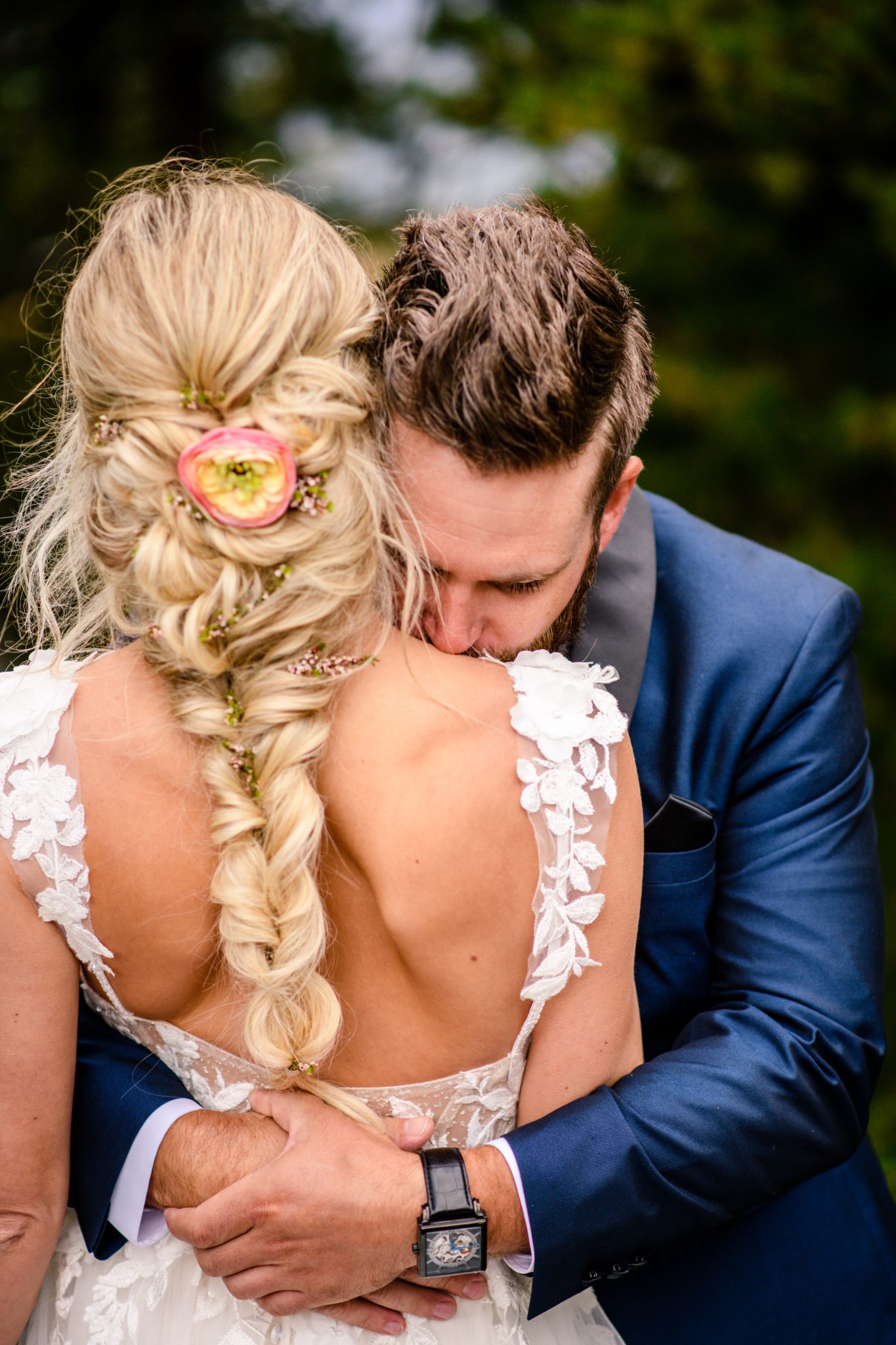 Glacier National Park Elopement couple hugging and enjoying the intimate moment with one another