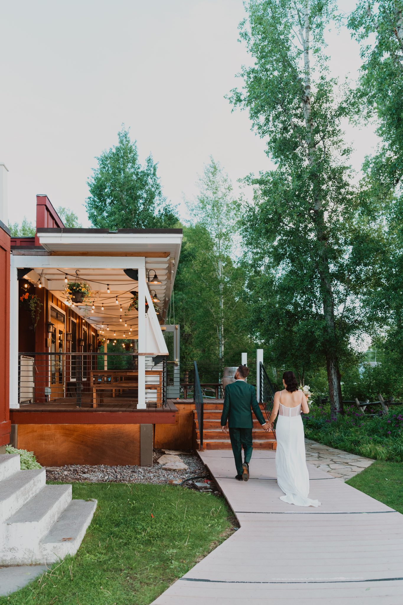 Grand Teton National Park Elopement newly weds walking into the reception area to celebrate with their loved ones