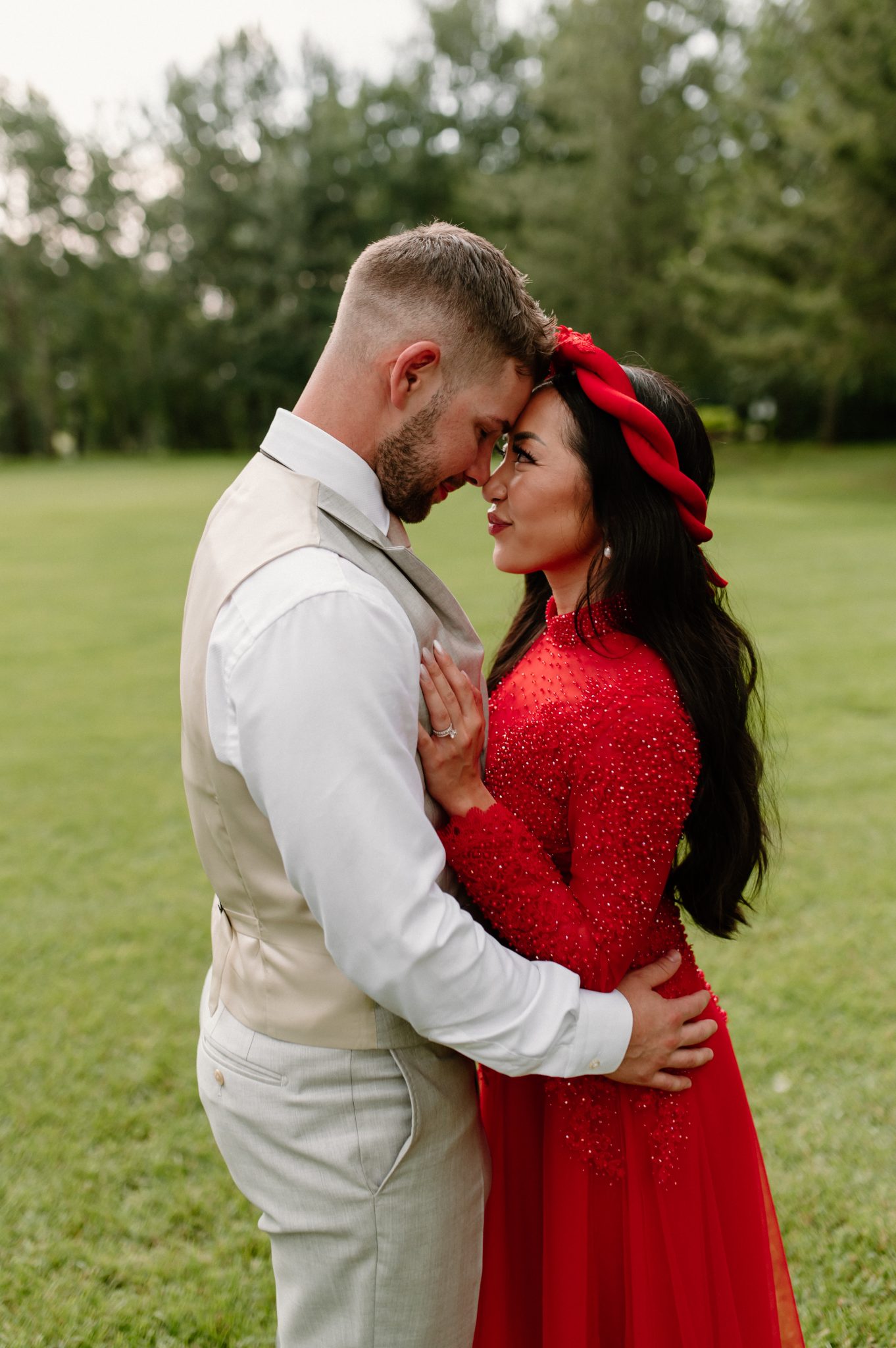 Hilltop Wedding Center Summer Wedding bride wearing her second dress which included a vibrant red color and sparkles