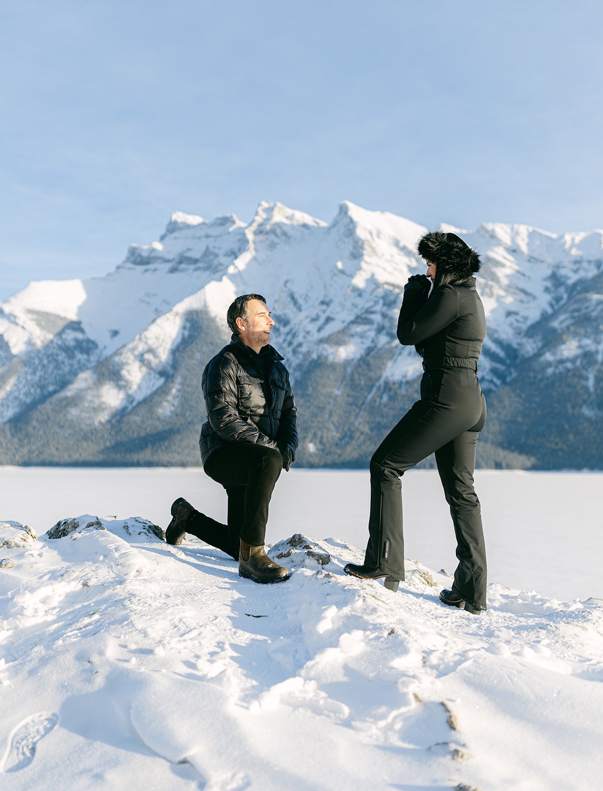 Alberta Wedding Proposal as he is down on one knee and she is full of joy