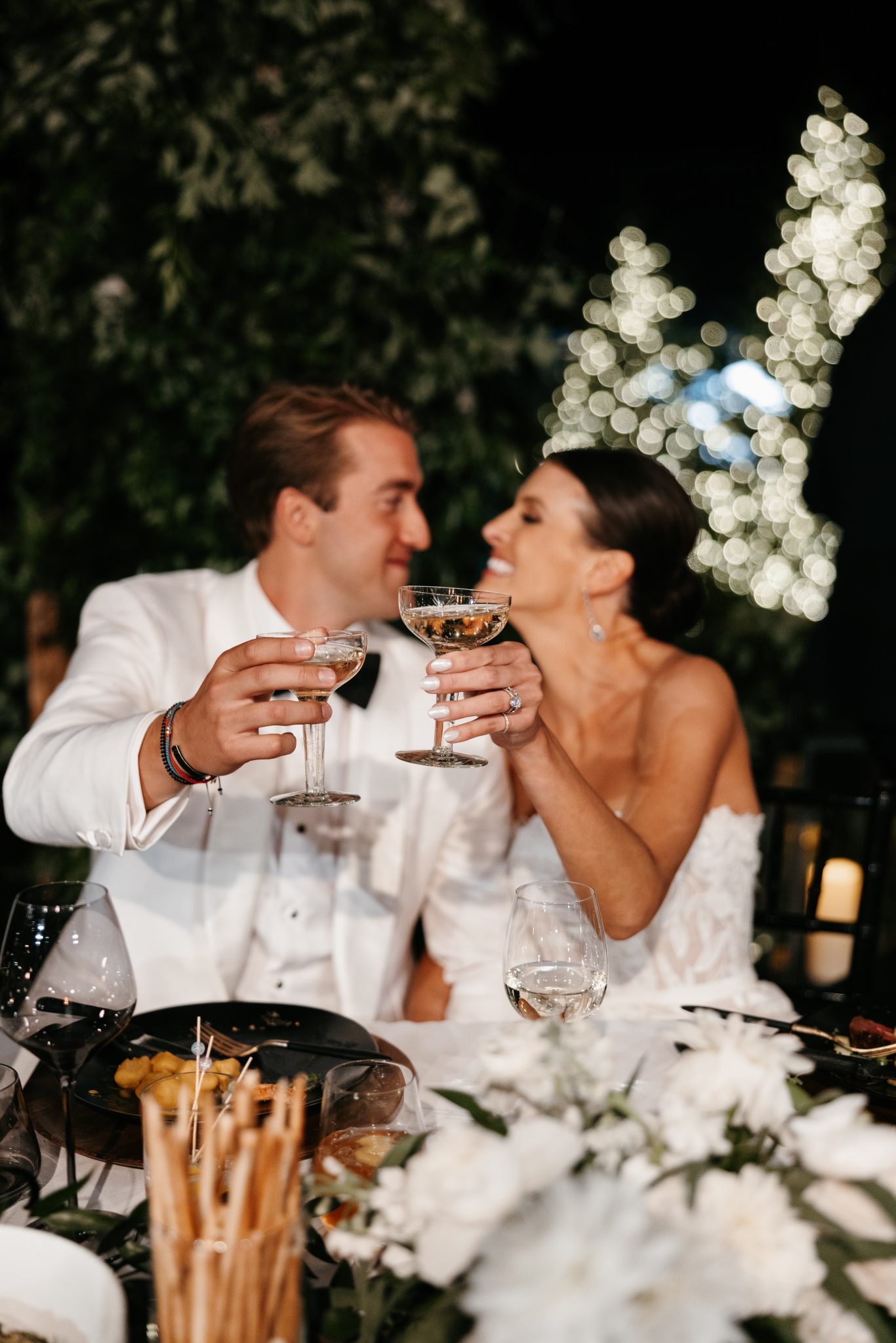 Snowmass Fall Wedding couple toasting to their wedding celebration
