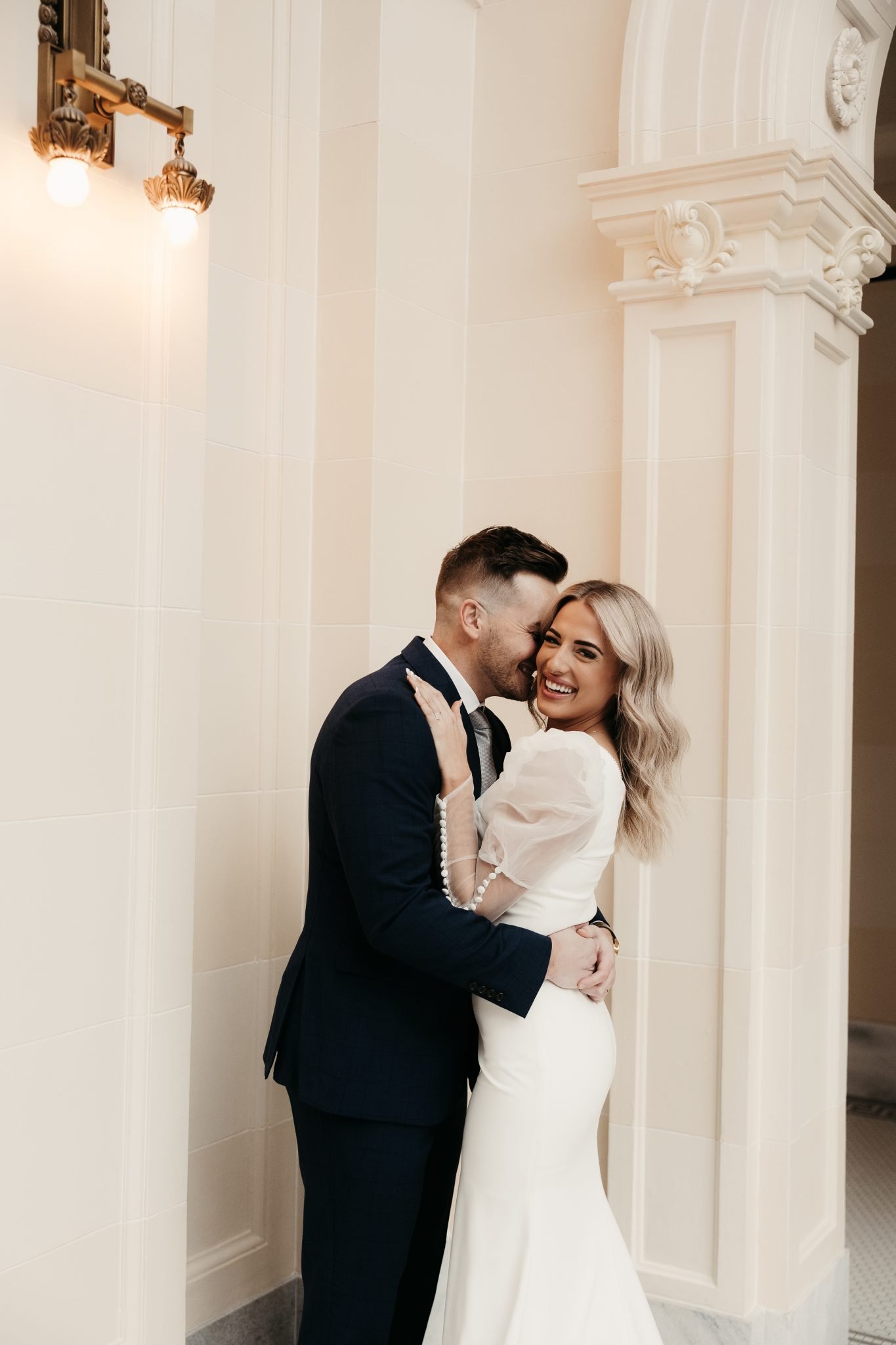 Utah Winter Engagement Session in Utah's state capital taking their sleek and chic engagement photos