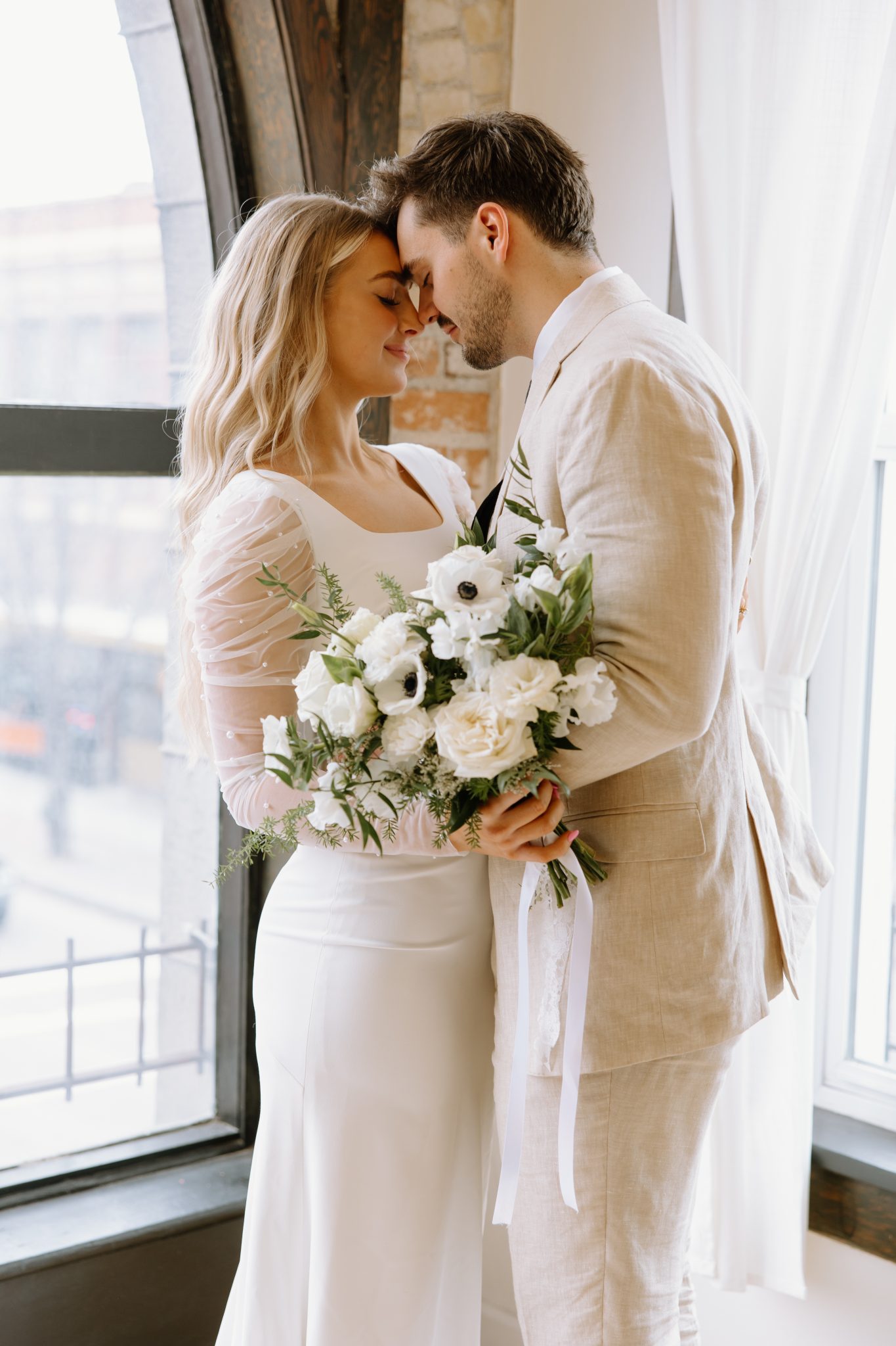 Winter Idaho Bridals at The Paris Studios couple forehead to forehead enjoying each other and embracing the moment