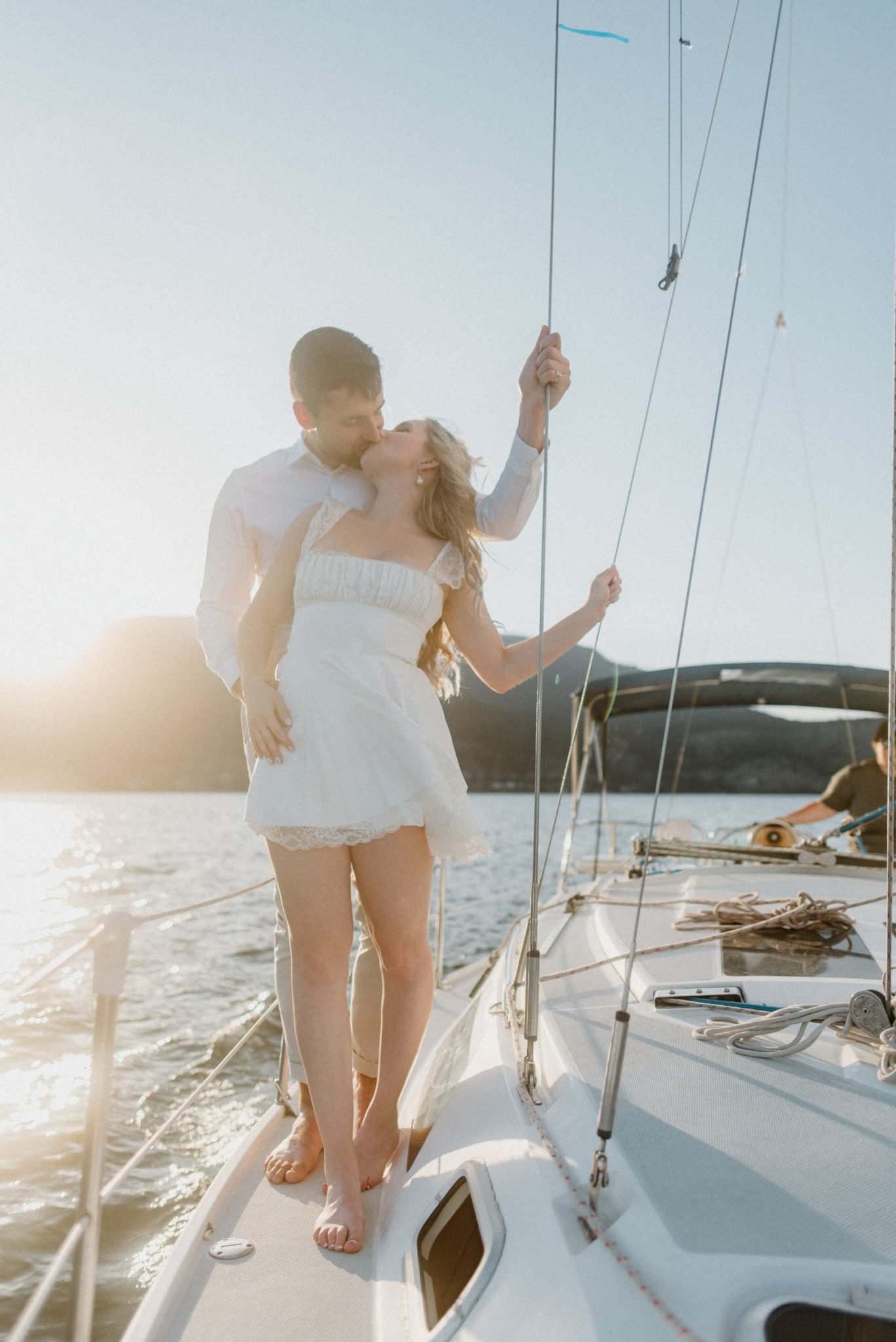Close-up of engaged couple smiling and looking at each other during Kelowna summer engagement