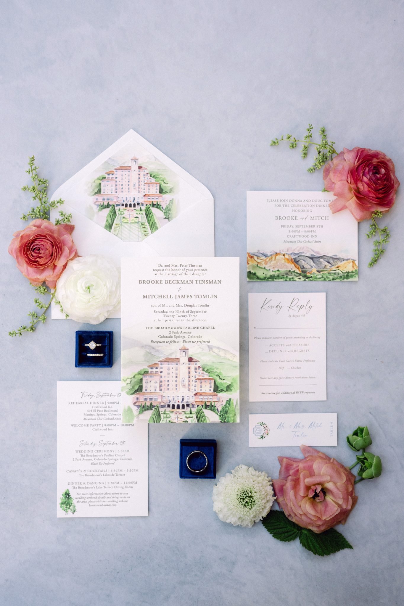 Elegant wedding invitation suite with floral accents at The Broadmoor Summer Wedding.