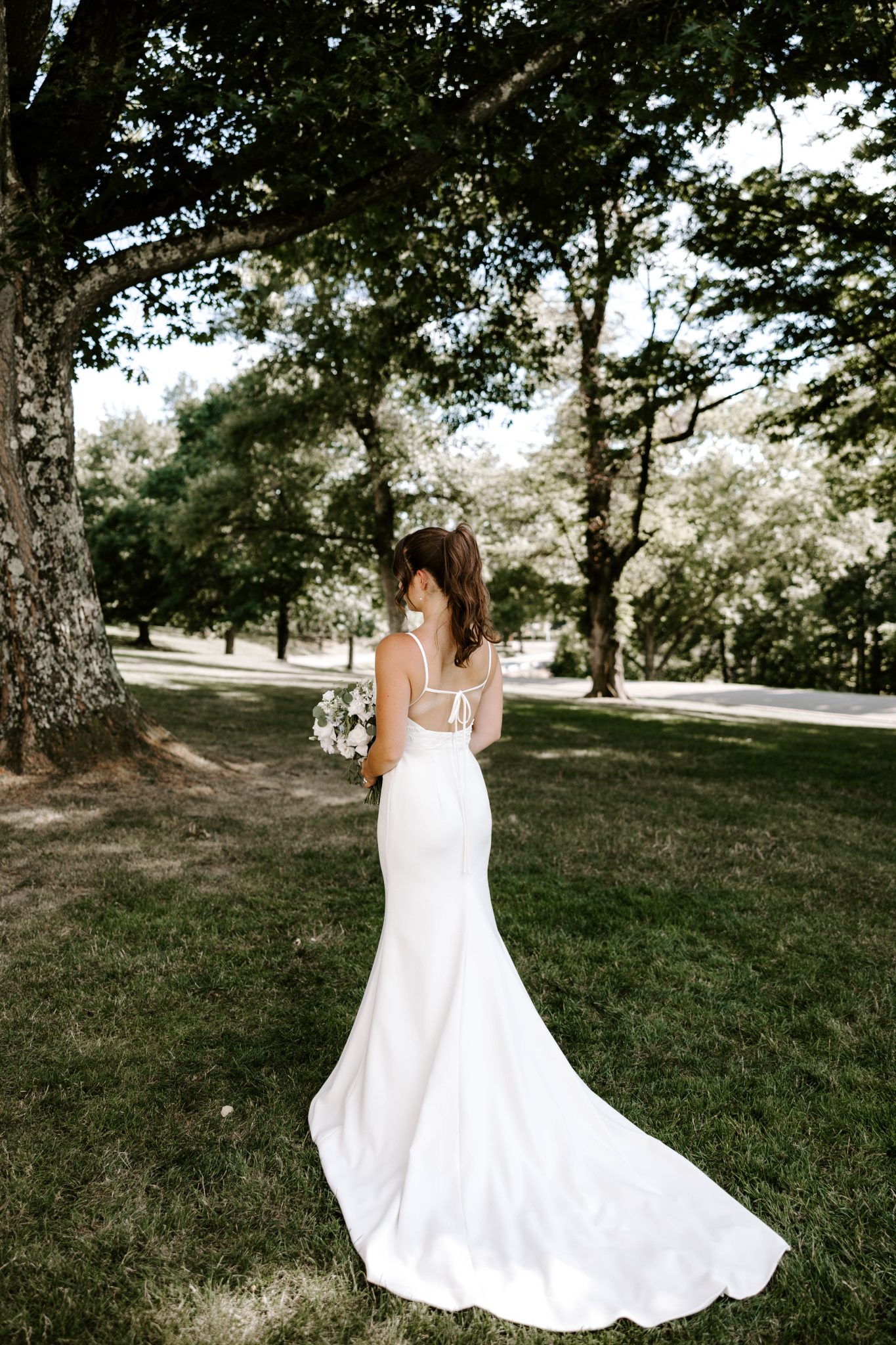 bride in white dress with High Party Ponytail