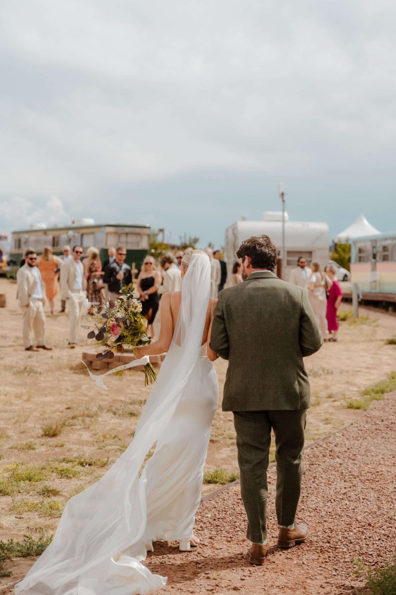 couple walking to their guests at Hotel Luna Mystica 
