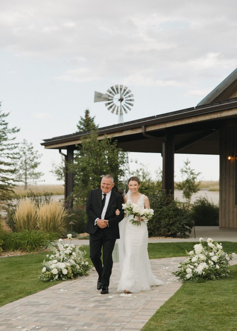 bride and father walking down the aisle