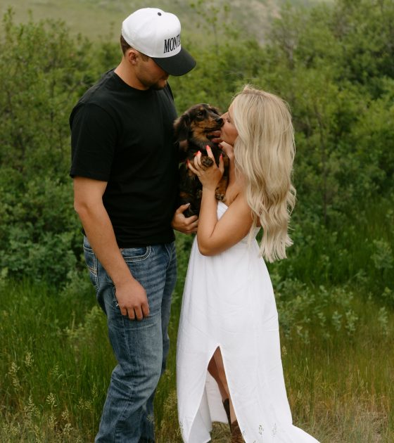 Montana Engagements with Sunlit Fields and a Playful Pup